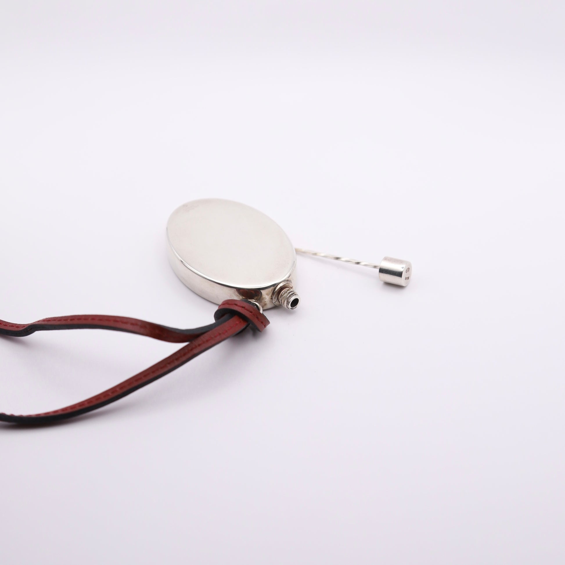 Hermes Silver Perfume Bottle Pendant Necklace， inside