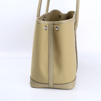 Hermes Garden Party TPM Handbag in  Poussiere Buffalo/Canvas 2022, left side