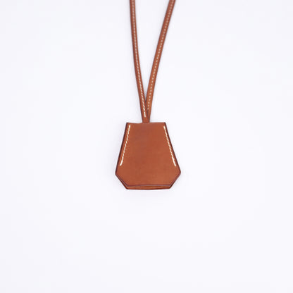 Hermes Barenia Clochette Keyholder Necklace Fauve, front view