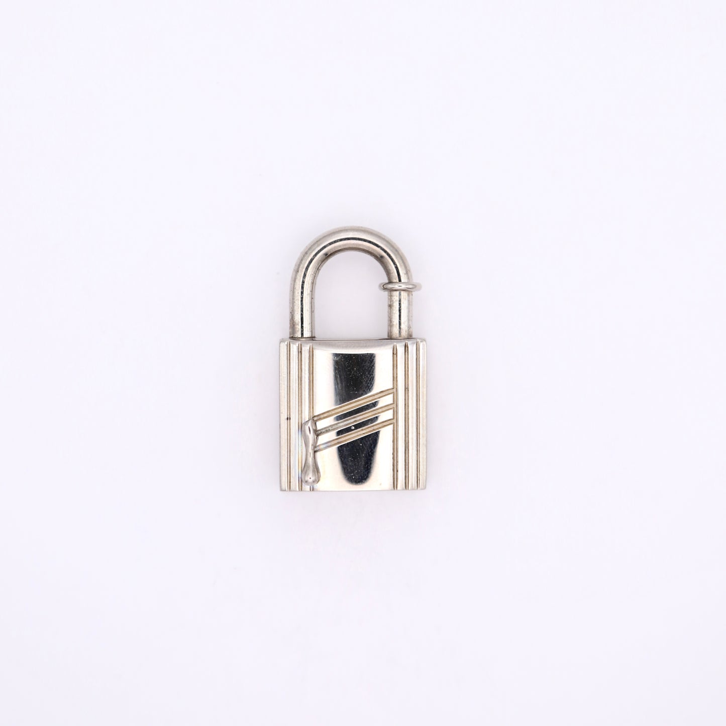 Hermes 1998 Limited Cadena Annee Aebre  Padlock Palladium Plated,front view 1. 