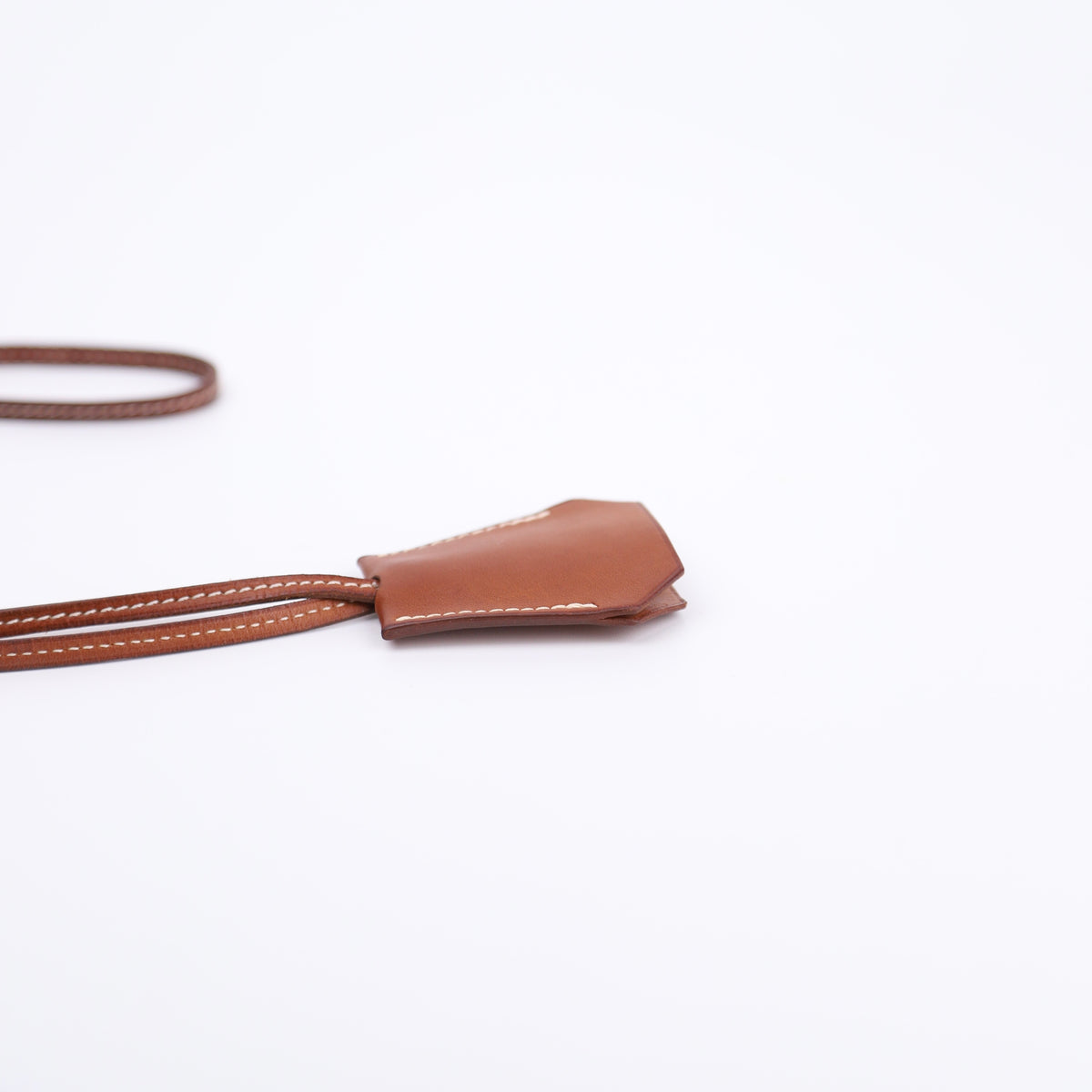 Hermes Barenia Clochette Keyholder Necklace Fauve, left side