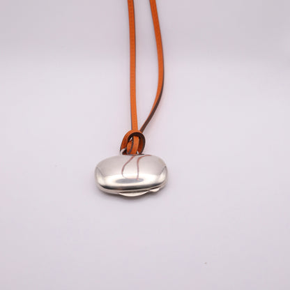 Hermes Sterling Silver 925 Pill Case Orange Leather Necklace，front view