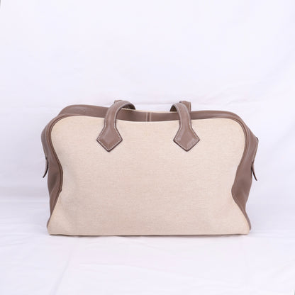 Hermes Victoria 35 Handbag in Taurillon Clemence/Toile Etoupe ,front view 1 