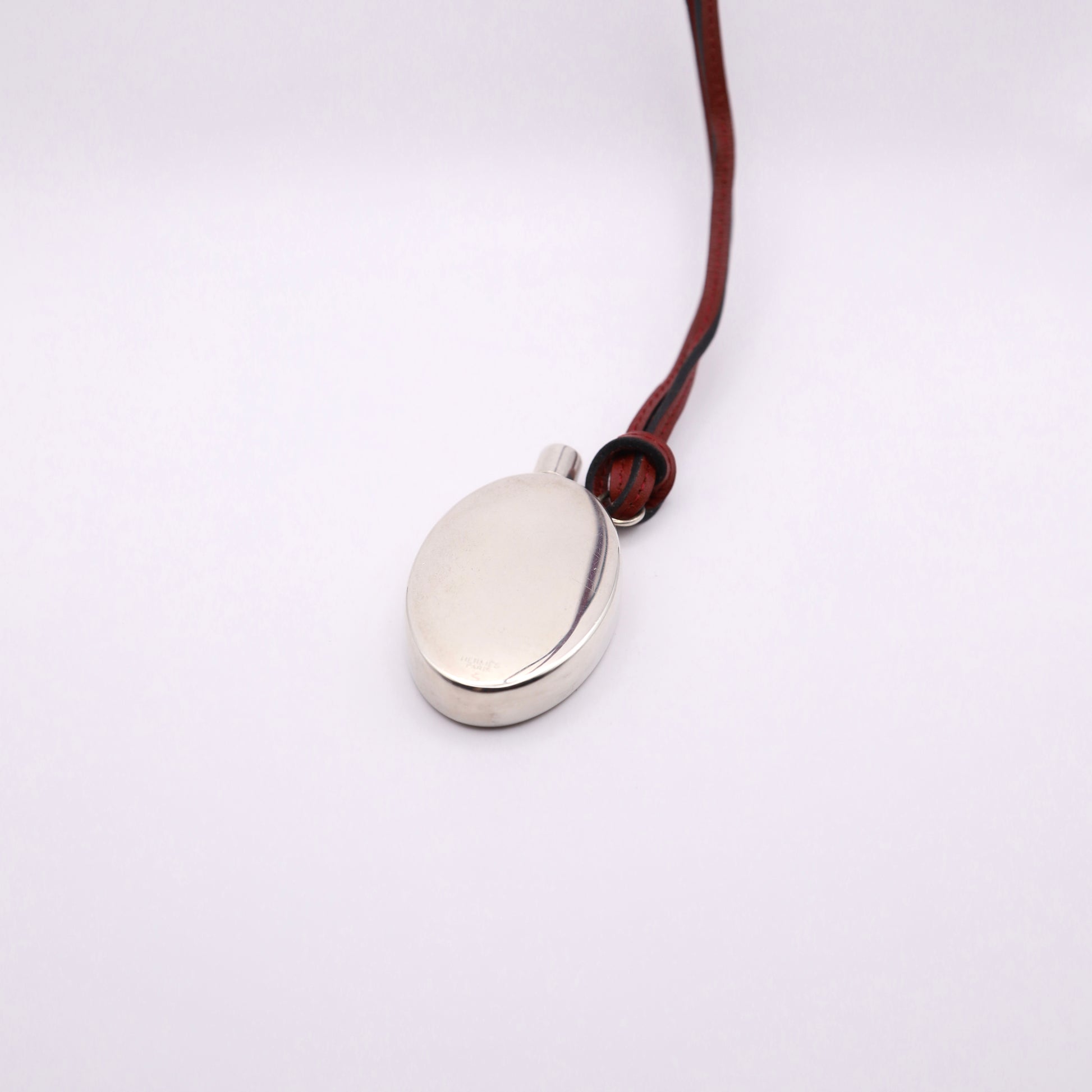 Hermes Silver Perfume Bottle Pendant Necklace，back view