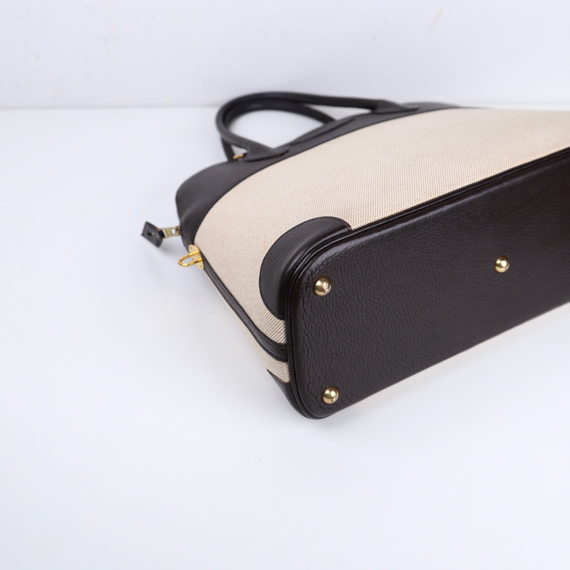 Hermès Bolide 35 2-way handbag in Ebene Taurillon Clemence and Toile,corner view 1