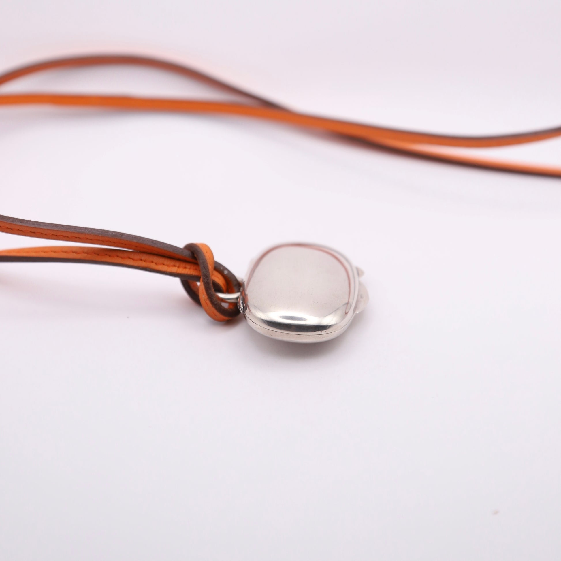 Hermes Sterling Silver 925 Pill Case Orange Leather Necklace，left view