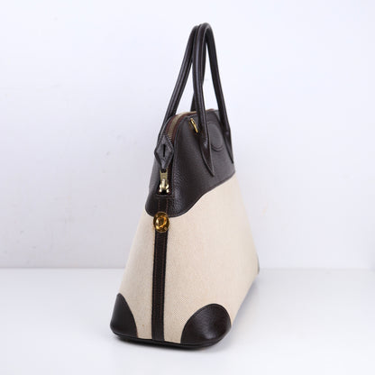 Hermès Bolide 35 2-way handbag in Ebene Taurillon Clemence and Toile, left side view